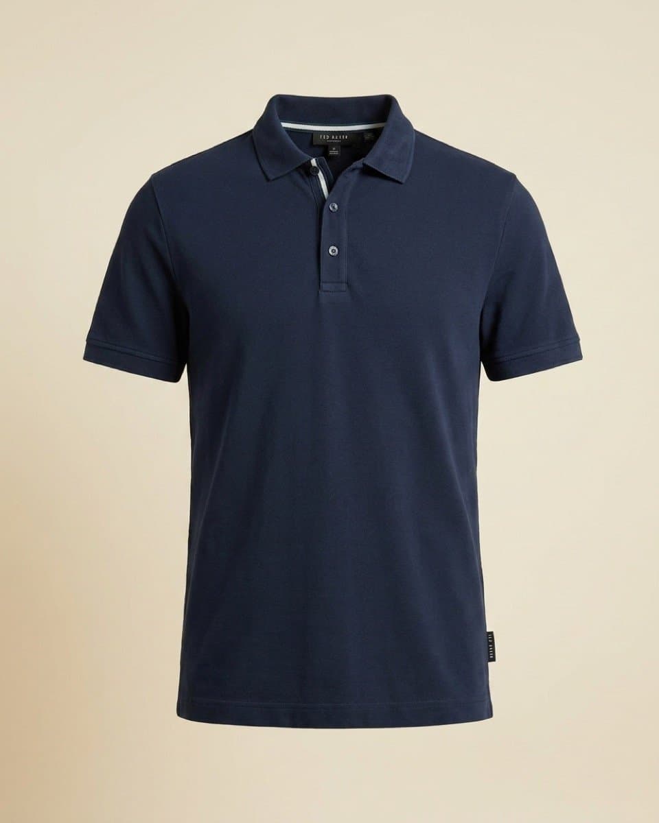 The same navy polo as a studio product photograph